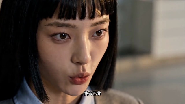 A close-up of the protagonist in The Laid-Off Girl as she says what she has decided to give up